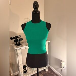 Green Cropped Ribbed Halter Top with a flattering criss-cross backless design